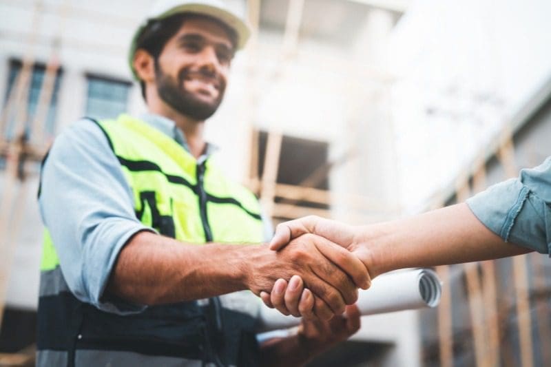 civil-construction-projects | Fast Labour Hire An image of a happy construction worker shaking hands